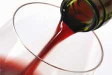 Photo of a glass of wine produced in the hills of Chianti